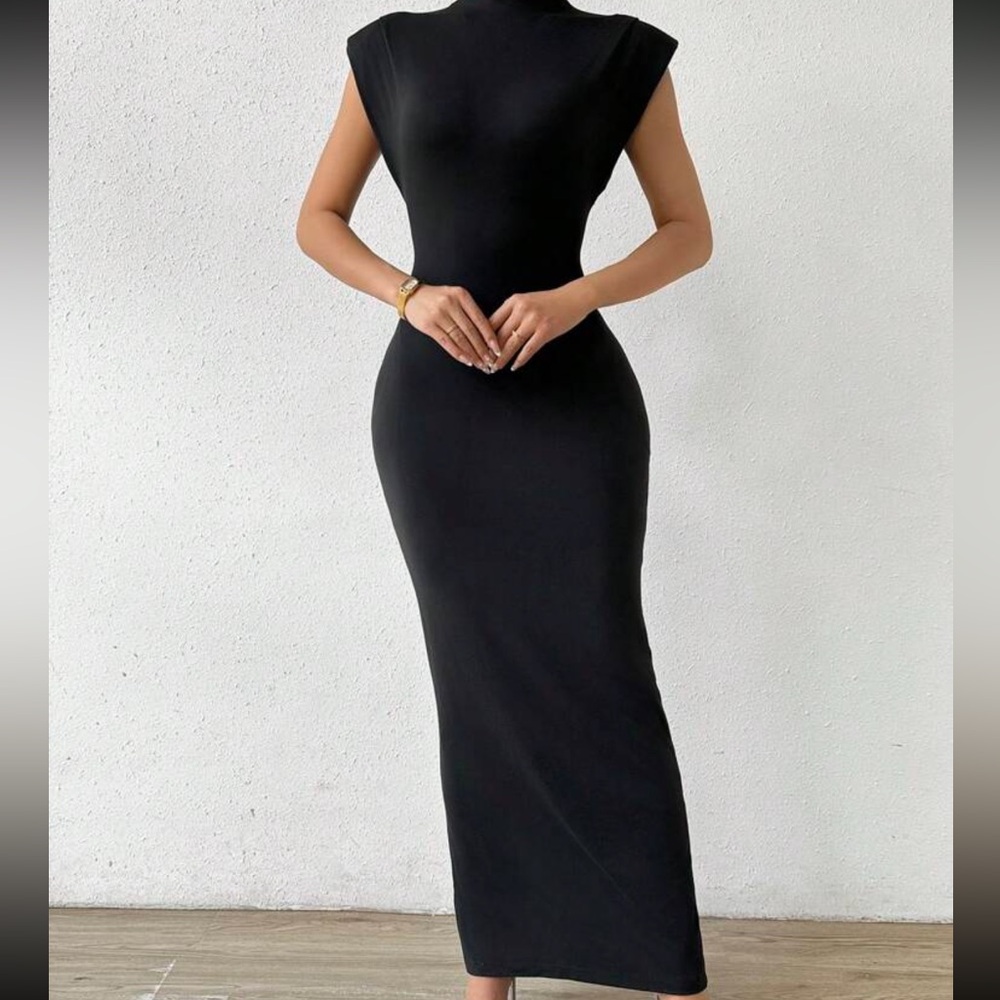 Black, long tight padded shoulders turtlenecks size small never worn like you